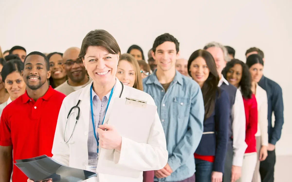 Doctor surrounded by patients