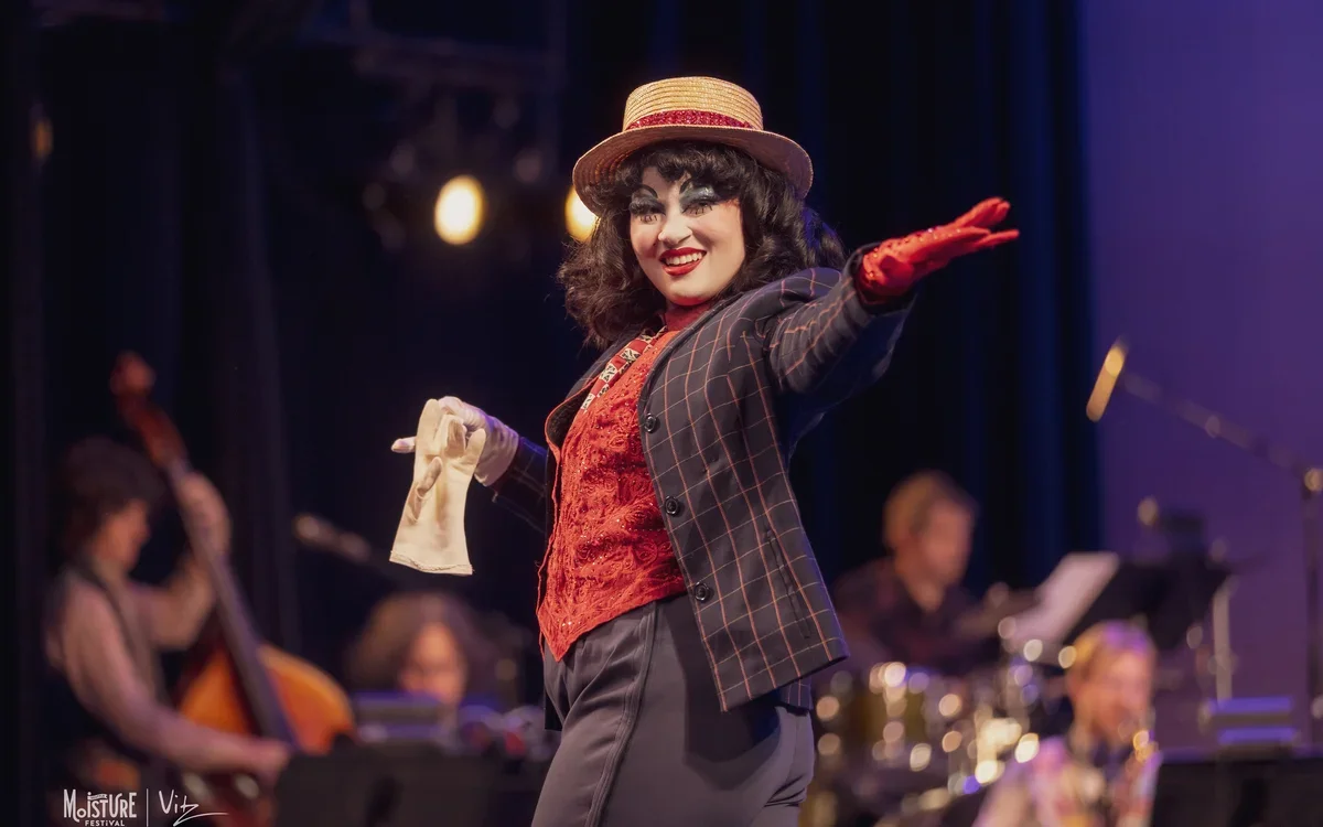 Image of woman performing onstage