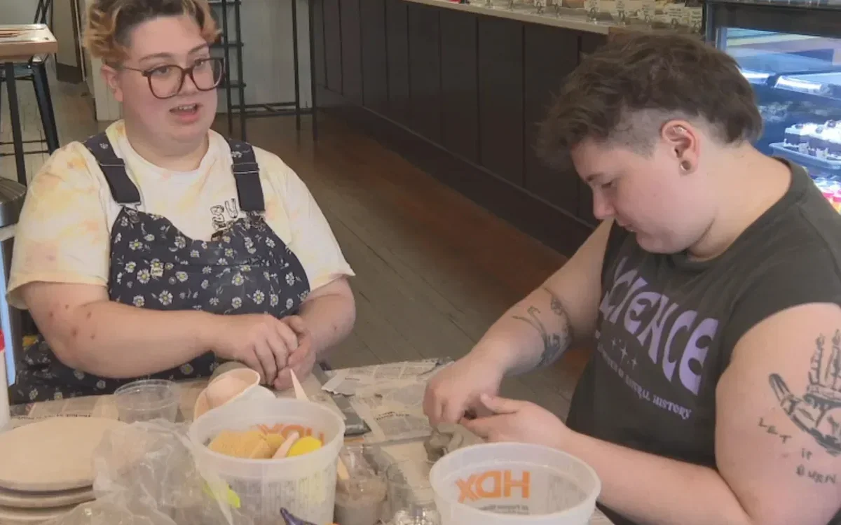 Image of two artists at work