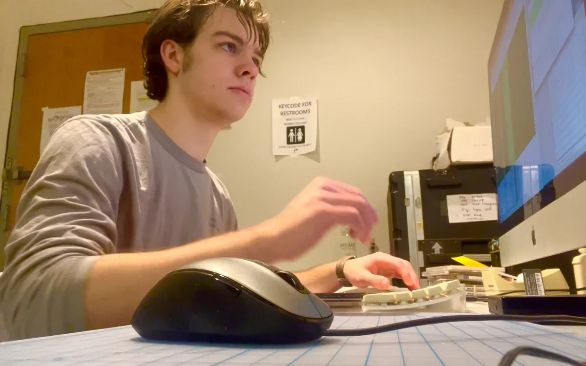 Image of Charlie Love on computer