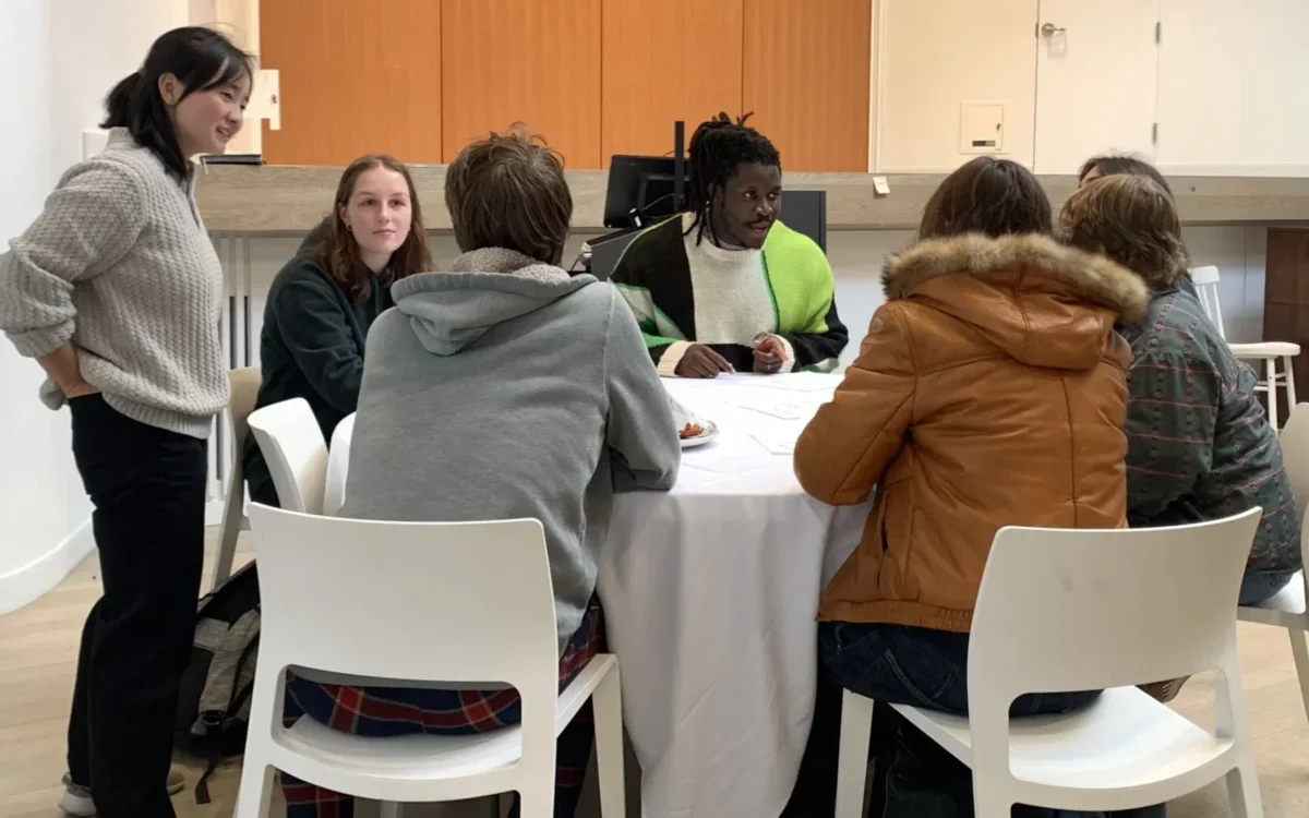 Image of group seated at table