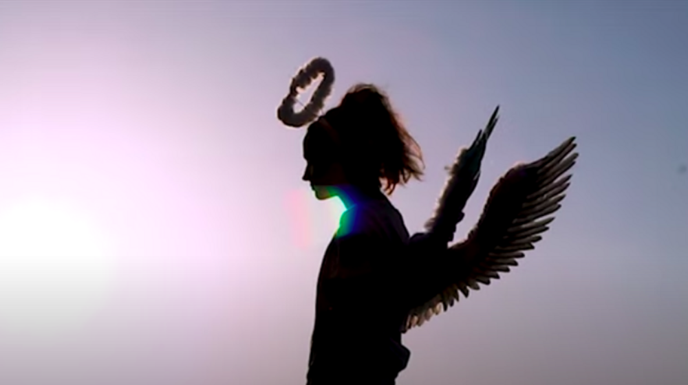 Photo of woman dressed as angel
