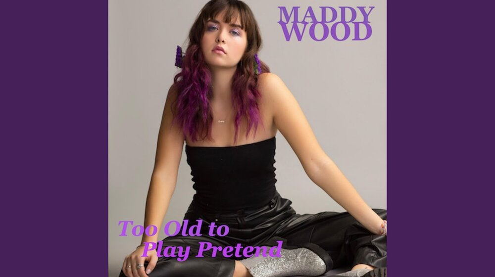 Photo of Maddy Wood on purple background