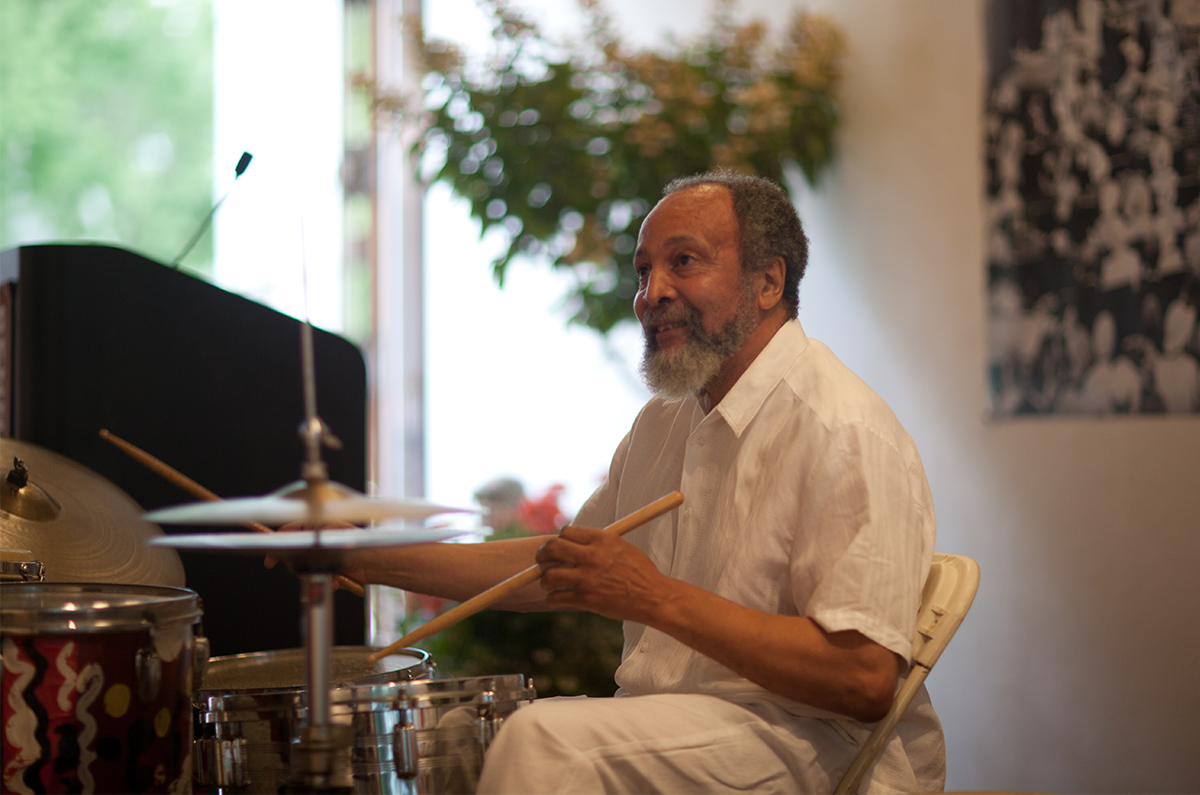 Milford Graves playing the drums