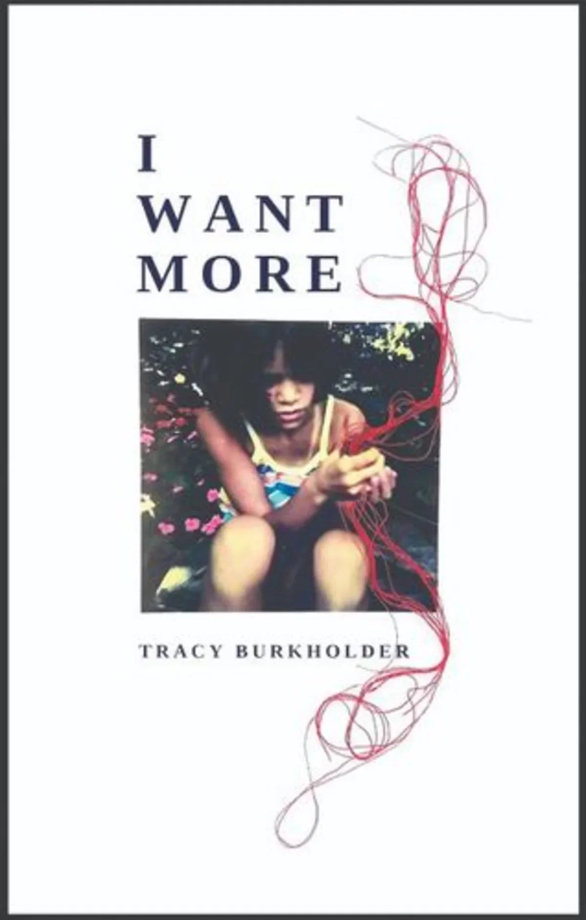 white book cover with small square photo of a child holding string in the middle