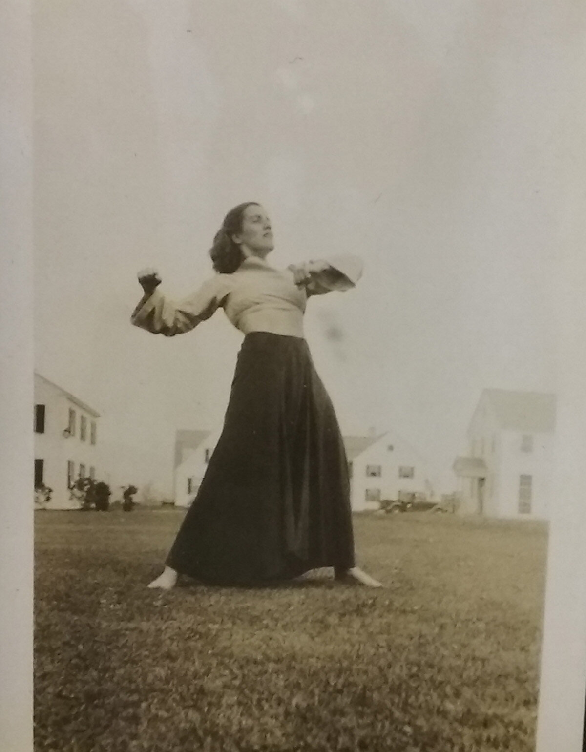 Photo of dancer on commons lawn