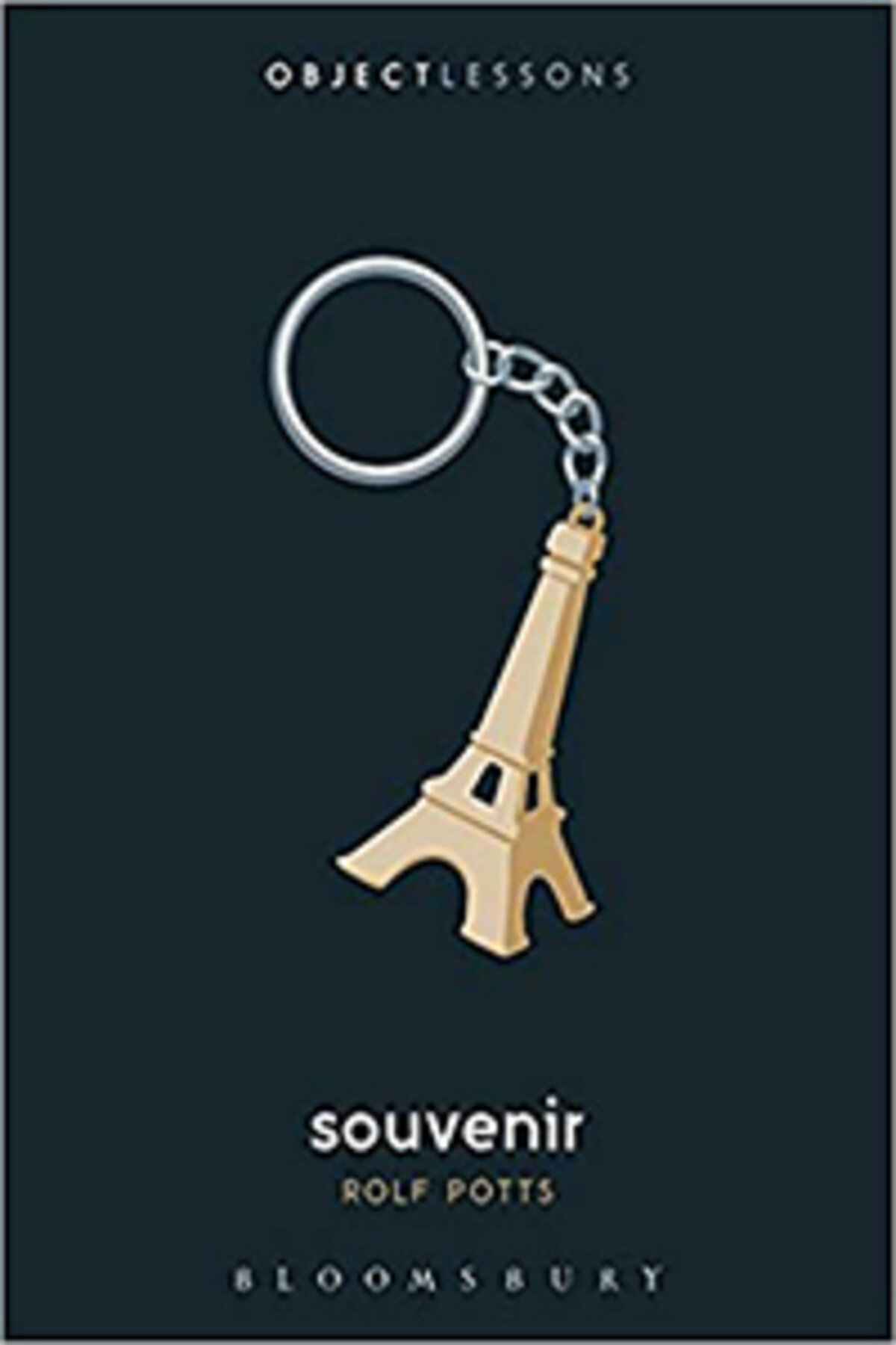 Eifle Tower keychain on book cover of Souvenir by Rolf Potts