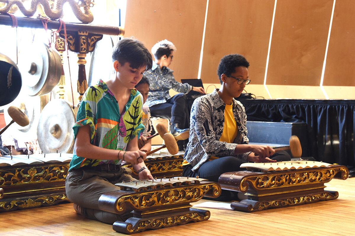 students playing the drums as part of the convocation 