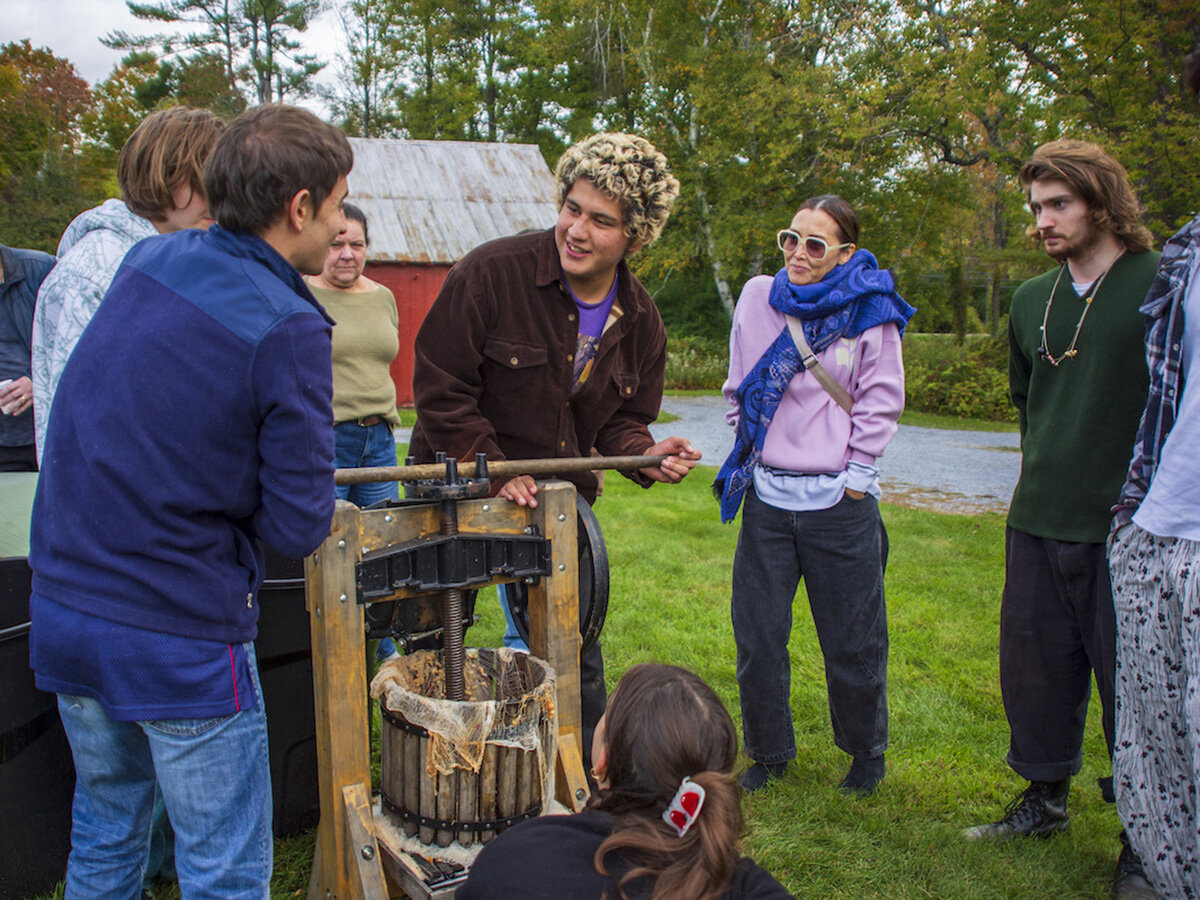 group of students making cider