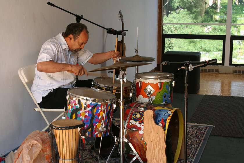 Milford Graves playing drums