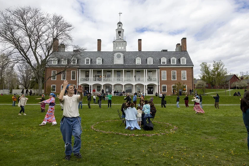 Dancers on lawn in front of Commons
