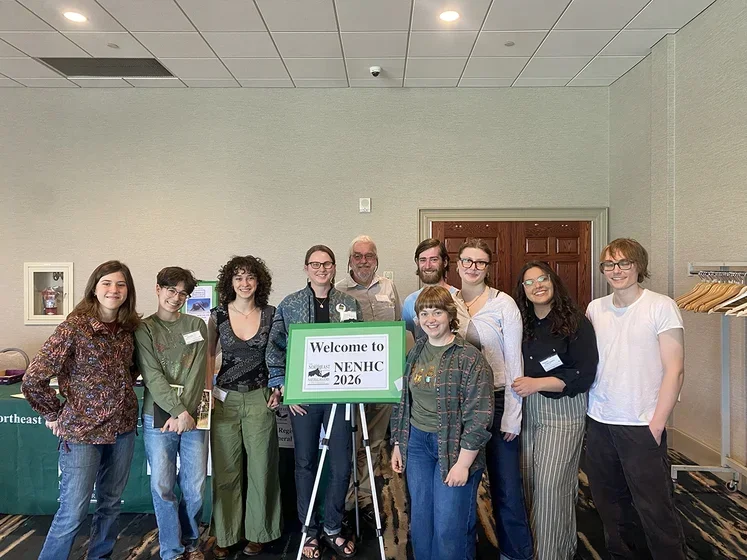 Image of smiling group at conference