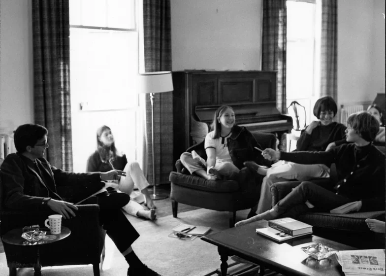 Students in a class held in a house living room, 1967