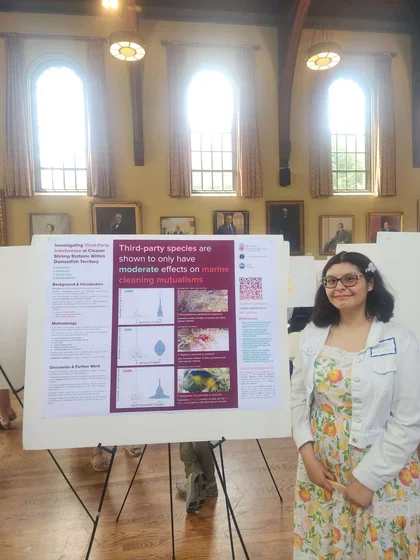 Andrea Lara with poster