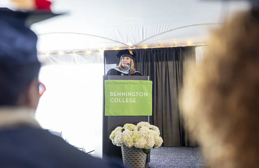 Interim President Elissa Tenny at the podium