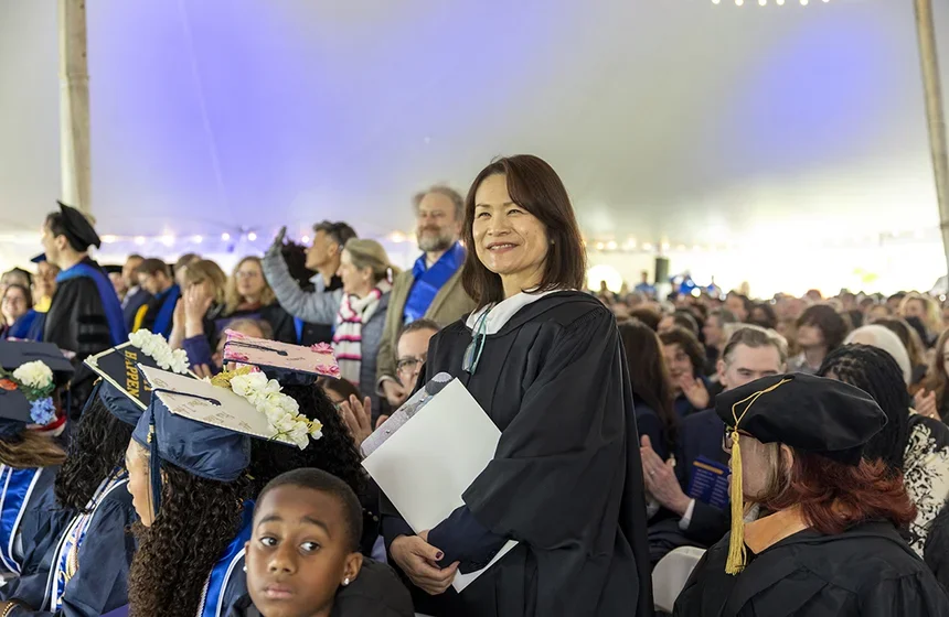 Faculty speaker Ikuko Yoshida at the podium