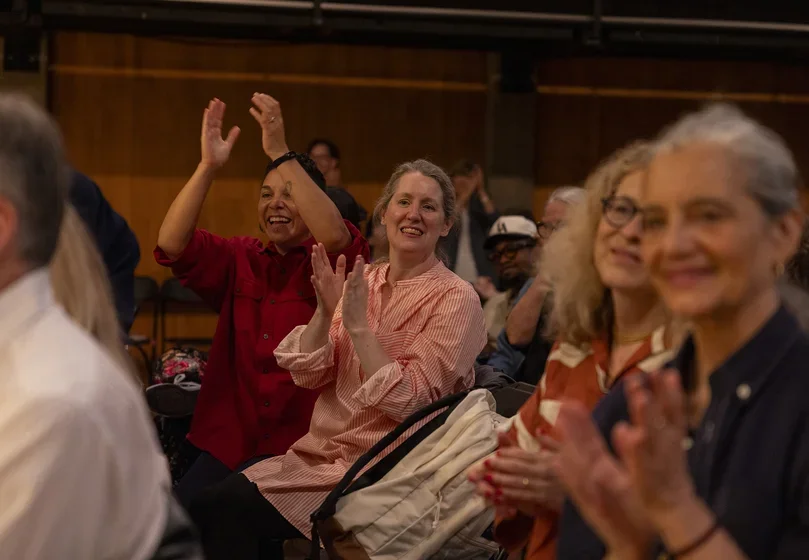 Faculty and staff members in the audience applauded enthusiastically to the opening musical performance, which included students and members of the faculty. 