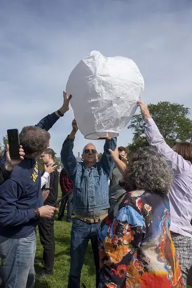 Image of crowd launching lantern