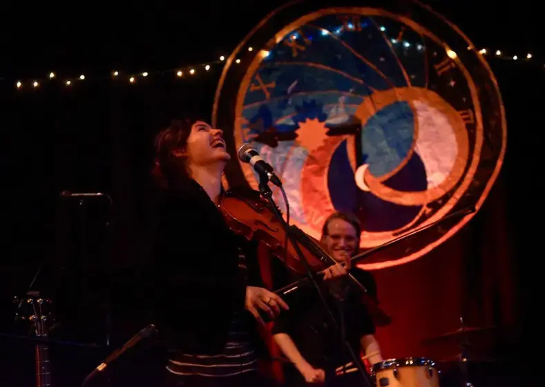 Image of woman playing fiddle