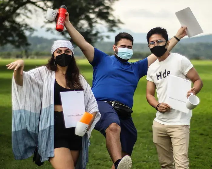 Image of three students in masks