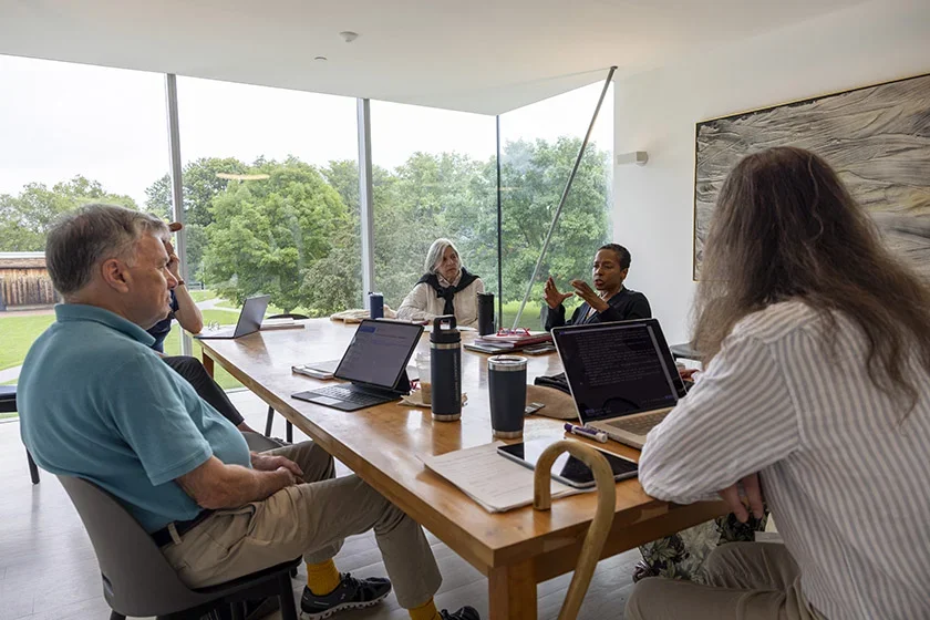 Image of students discussing in class