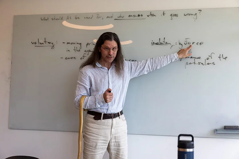 Image of man at whiteboard