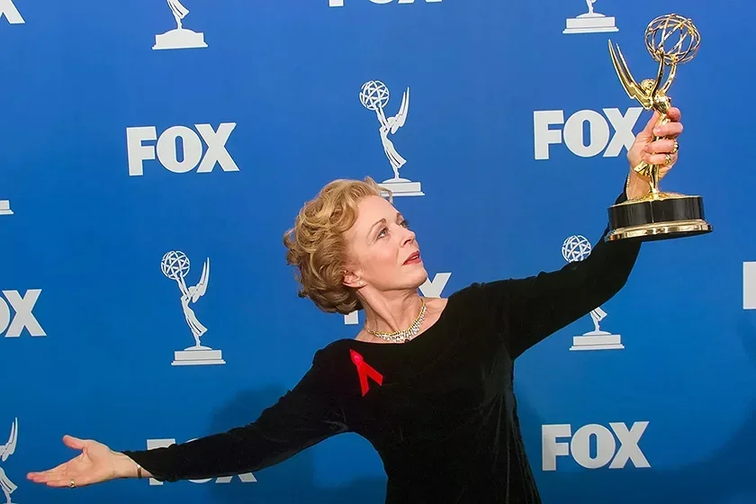Image of Holland Taylor holding Emmy