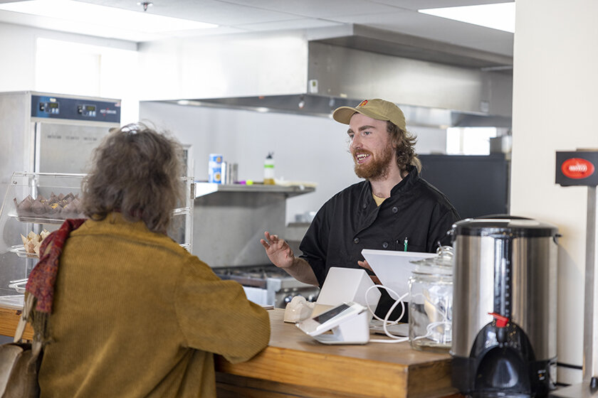 Image of man selling coffee