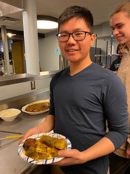 Image of student posing with food